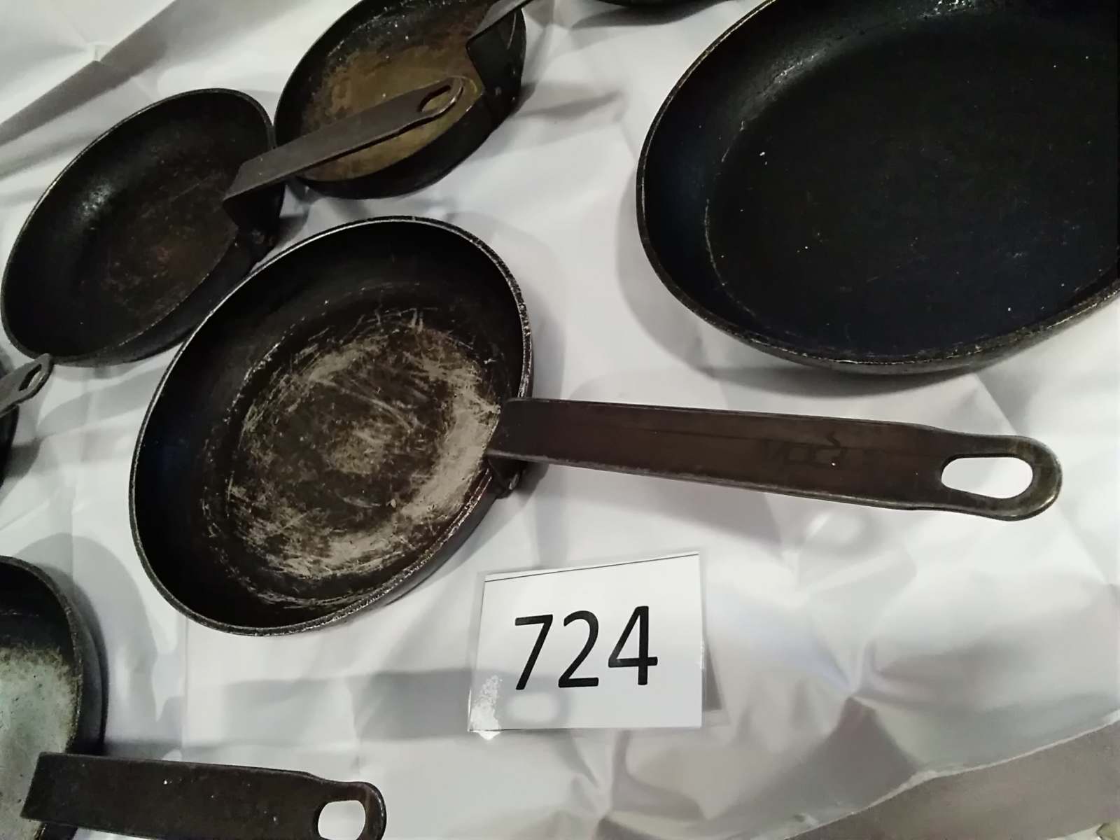 lot 724 7x sauce pans ( frying pans) Hill's Trading Company Ltd