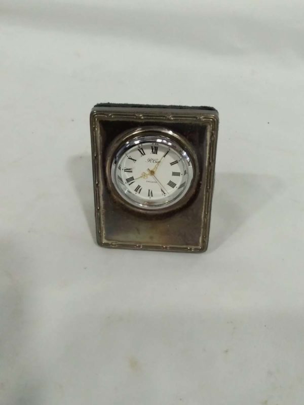 lot 293 silver cased miniature clock