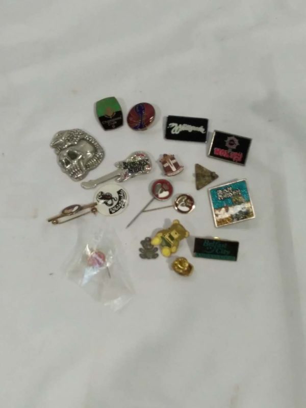 lot 308  badges and pins