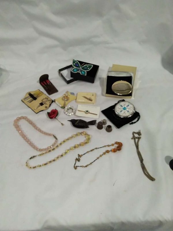 lot 309 costume jewellery, Harrods compact, manicure sets etc