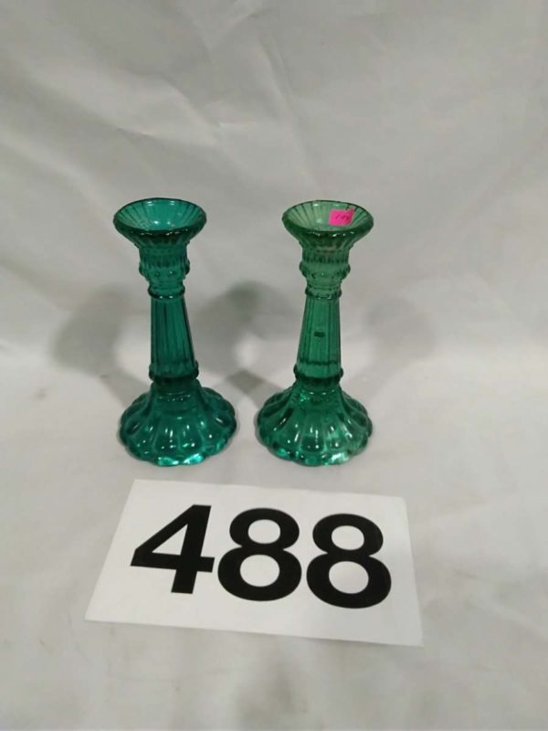 lot 488 pair of green glass candle sticks