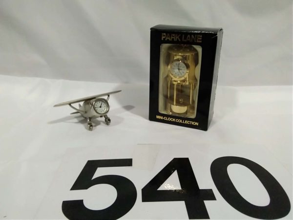 lot 540  brass miners lamp & aeroplane minature clocks