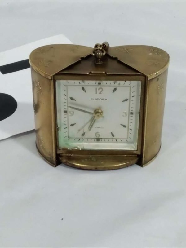 lot 137 1930’s Europa brass travel clock ( working) ( crack in glass