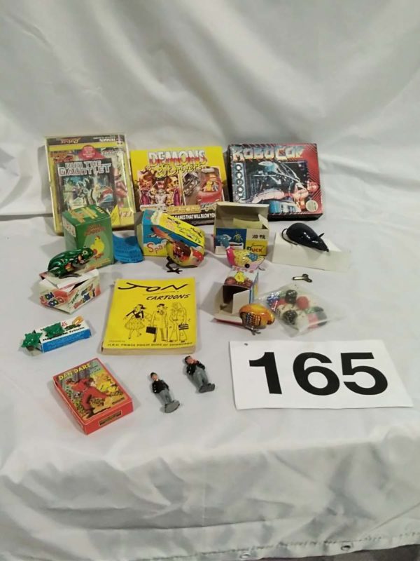 lot 165 computer games, tin plate toys, metal laural & hardy