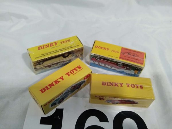 lot 169 4 modern Dinky cars still sealed - Image 5