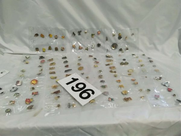 lot 196 collection of pin badges in plastic sleeves