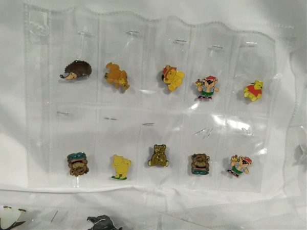 lot 196 collection of pin badges in plastic sleeves - Image 2