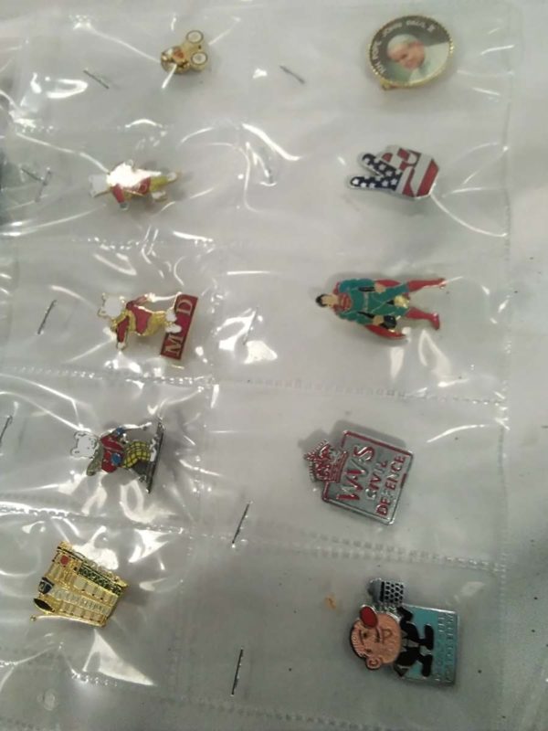 lot 196 collection of pin badges in plastic sleeves - Image 7