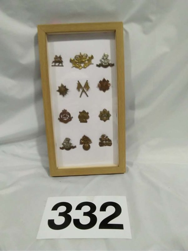 lot 332 framed military badges