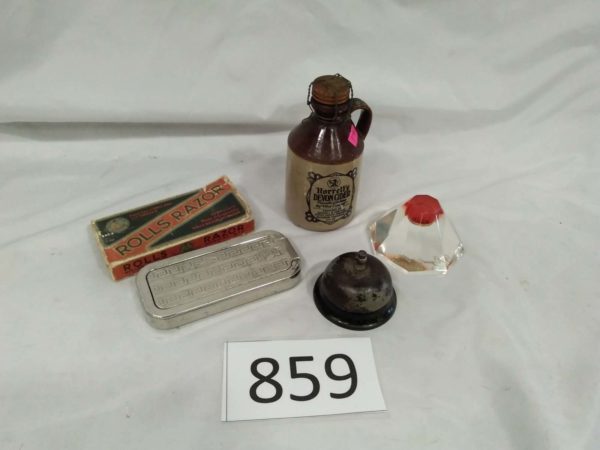 lot 859 Rolls Razor,desk  bell, cider bottle & royal mind £1 paperweight