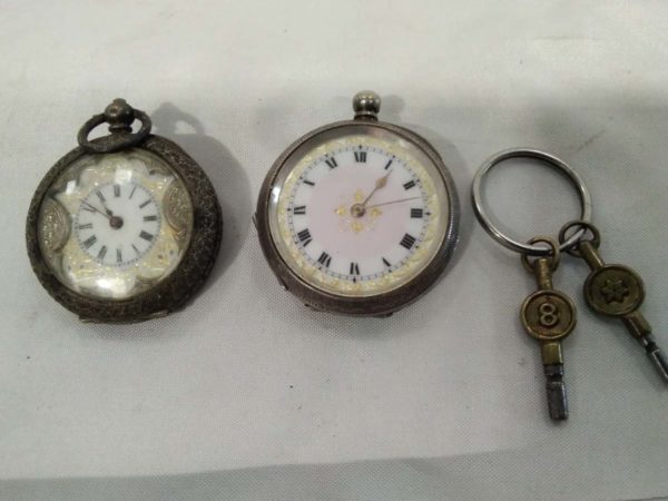 lot 032 2 silver pocket watches marked 0.935 continental & keys