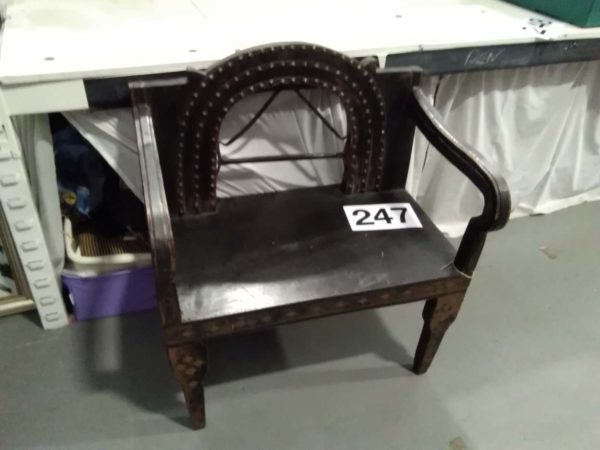 lot 247 Indian love seat with brass & castiron decor