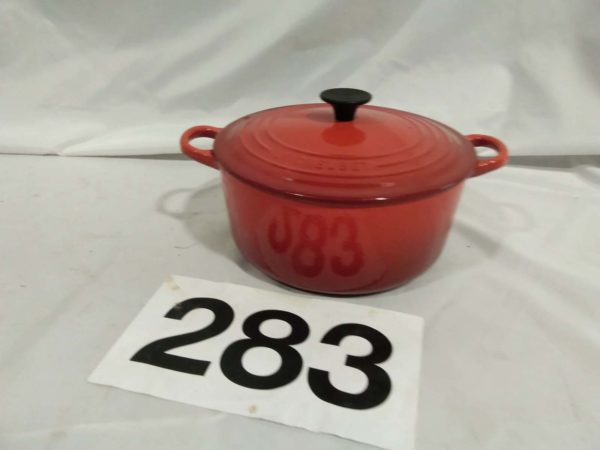 lot 283 Le Crueset red casserole dish with lid