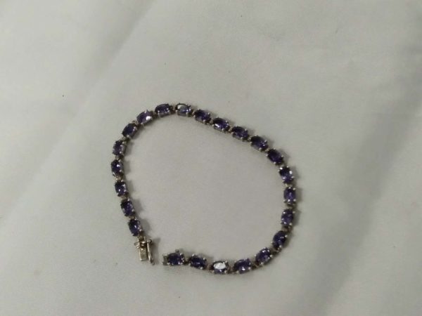 lot 474 sterling silver & tanzanite tennis braclet