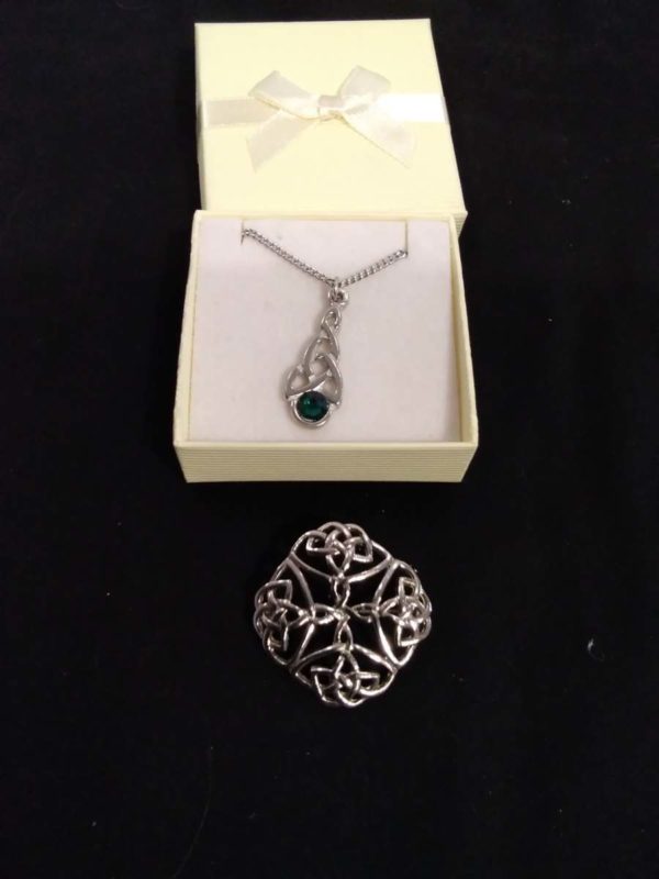 lot 847 celtic pendant with green stone & brooch