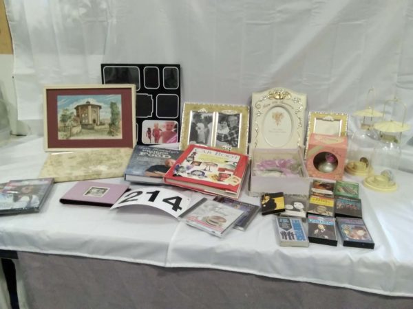 lot 214 photoframes, books, outdoor lanterns,cassettes