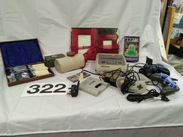 lot 322 super Nintendo with games, vintage cutlery, etc.