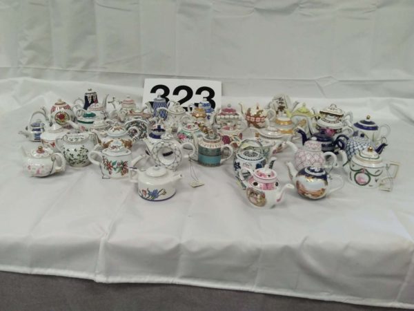 lot 323 40 x miniature china teapots - Image 2