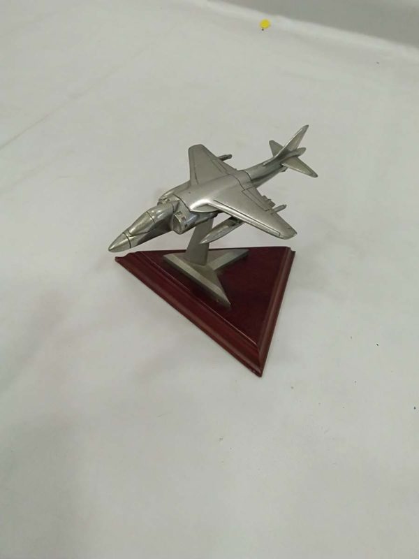 lot 235 Royal Hampshire Harrier solid pewter model plane on plinth