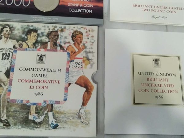 lot 548 3x Royal Mint coin packs – 1986 x2 & Millenium £5 - Image 4