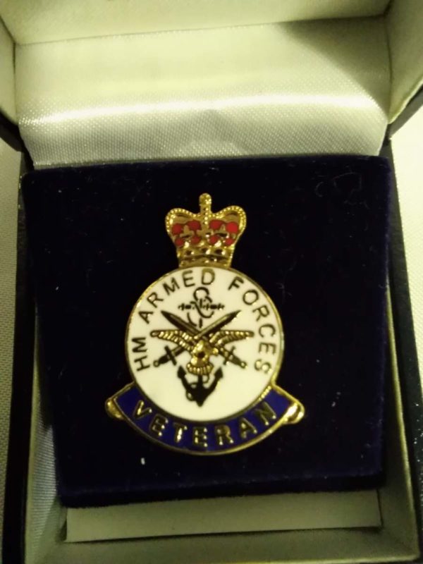 lot 742 British Military Toye Kenning Spencer Veterans lapel badge – boxed