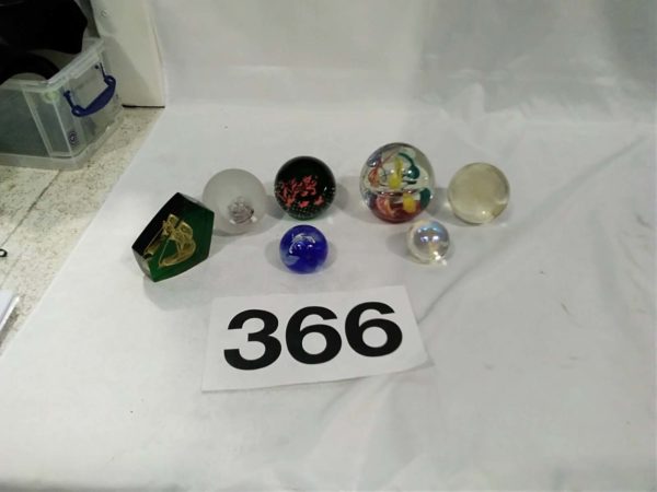 lot 366 6x glass paper weights & 1x plastic paper weight