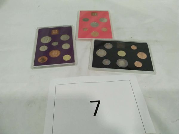 lot 007  British Cased coin sets 1970. 1973, 1983