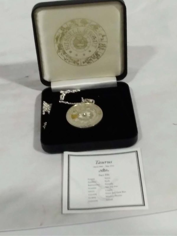 lot 022 sterling silver pendant from Russel Grant & London mint ” Taurus Zodiac pendant”