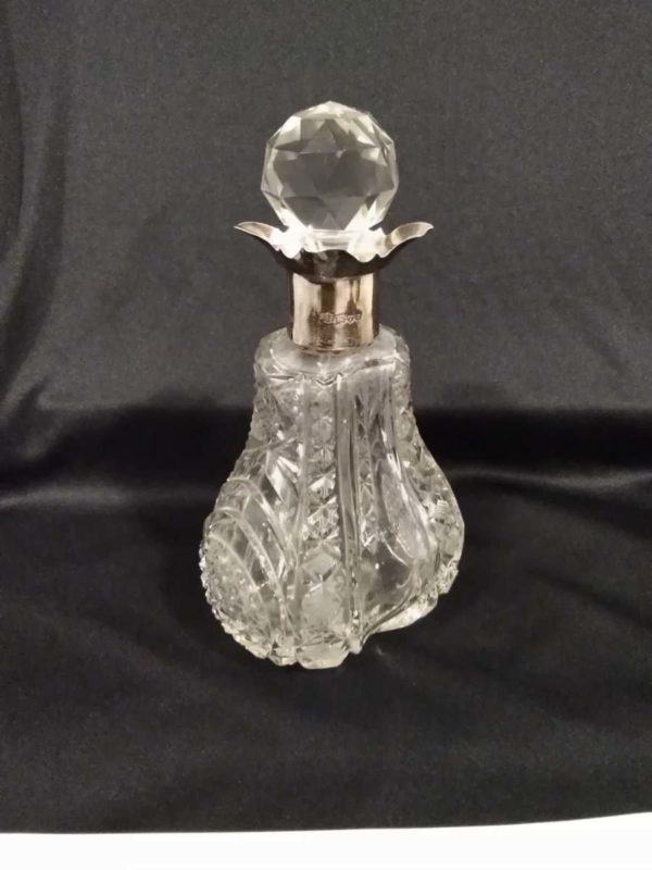 lot 043 cut glass tall perfume bottle with sterling silver collar