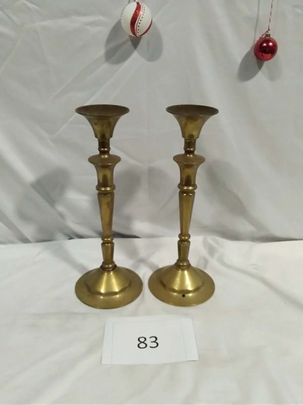 lot 083 large brass candle sticks approx 49cm ( one has a hole in base)