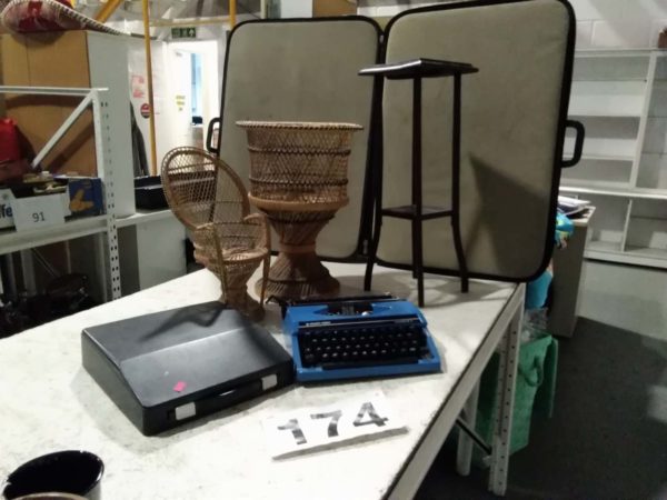 lot 174 Silver Reed portable typewriter, plant stand & 2 x wicker items