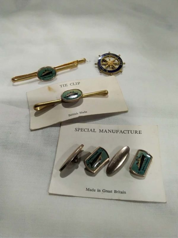 lot 244 Queen Elizabeth cuff links, tie pins, brooch