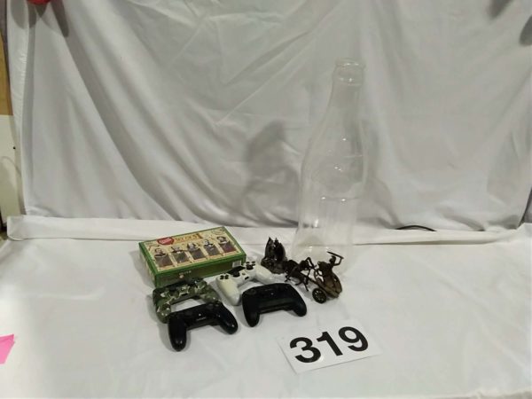 lot 319 PS controllers, plastic coke bottle, metal ornaments, puzzle