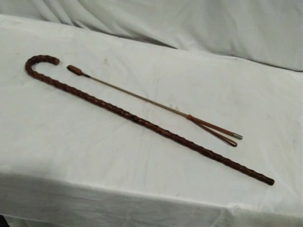 lot 470 walking stick & whip