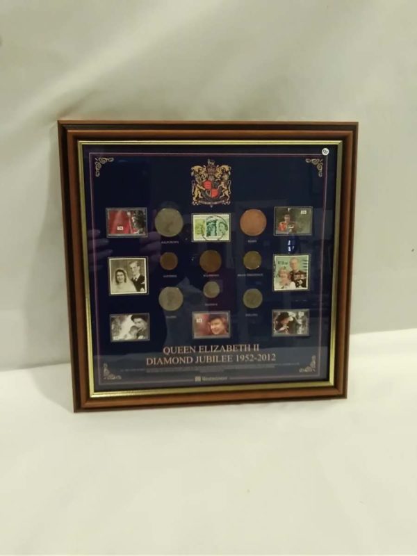 lot 550 Queen Elizabeth II Diamond Jubilee 1952 – 2012 framed stamps & coins