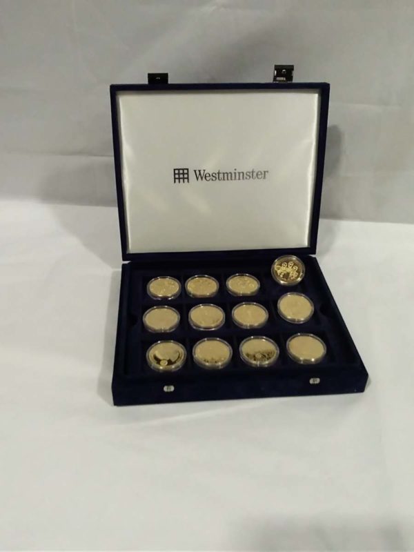 lot 553 royal themed cased coins in presentation box