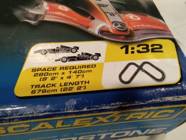 lot 613 Silverstone Scalextric complete with cars advengers books and PS controllers - Image 8