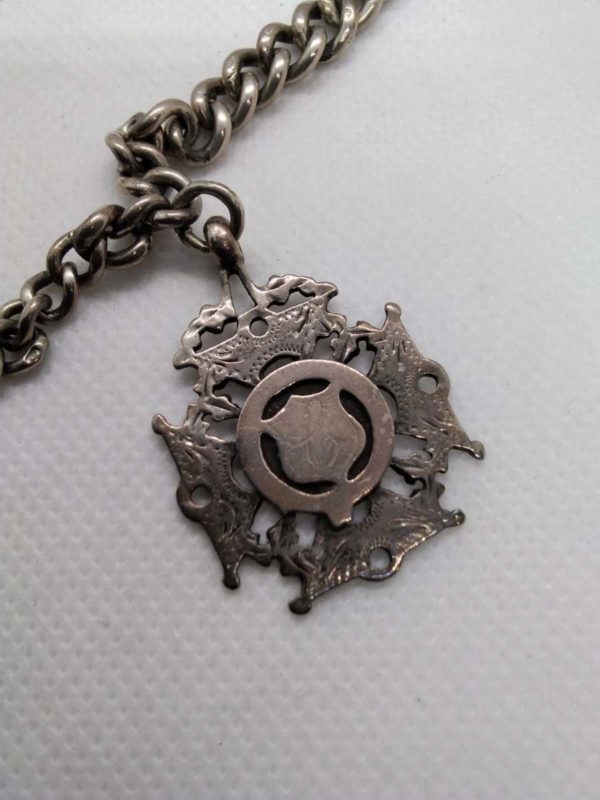 lot 645 Antique sterling silver Albert chain with medal - Image 7