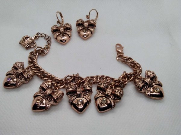 lot 650 boxed Butler & Wilson Charm bracelet & earrings