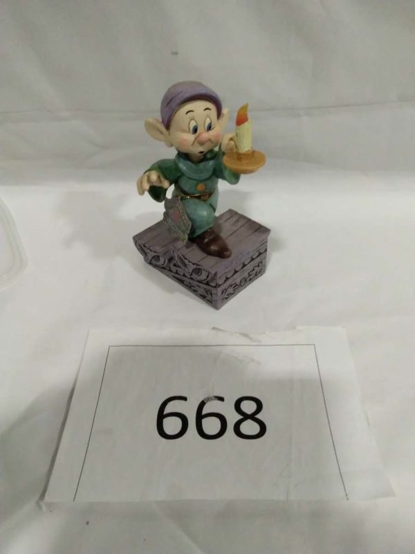 lot 668 Large Enesco Disney figure – A light in the dark