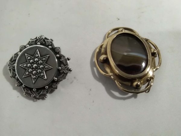 lot 675 2 Victorian brooches – sterling silver & Pinchbeck