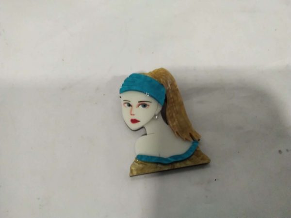 lot 756  Attractive Resin girl brooch