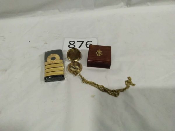 lot 876 Captains Epaulets & cased compass