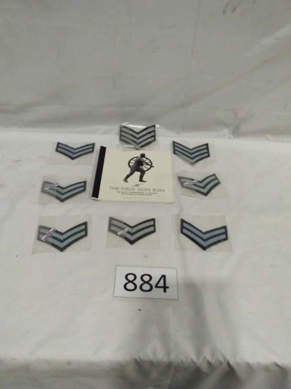 lot 884 8x Sergent & Corporals Chevrons & field gun run book