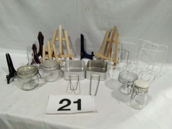 lot 021 Mini easle’s, plate stands, jars, camping billy cans