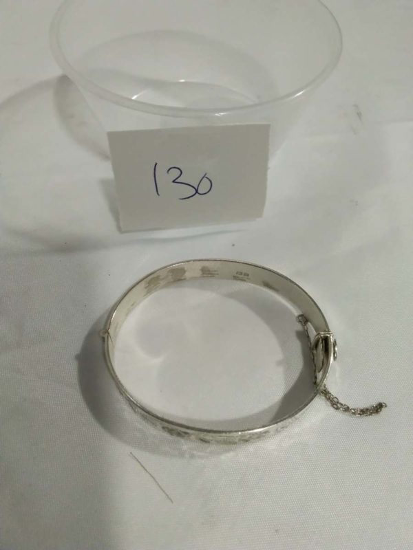 lot 130 Hallmarked Sterling silver hinged engraved bangle