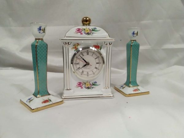 lot 319 decorative porcelain mantle clock (working) & a pair of candlesticks by Past Times