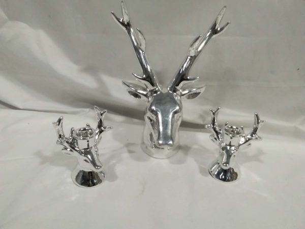 lot 333 ornamental stag head & a pair of candle holders