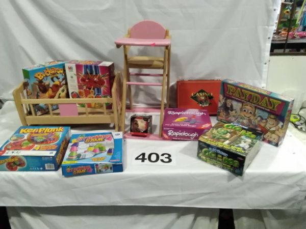 lot 403 various games, Dolls crib and highchair