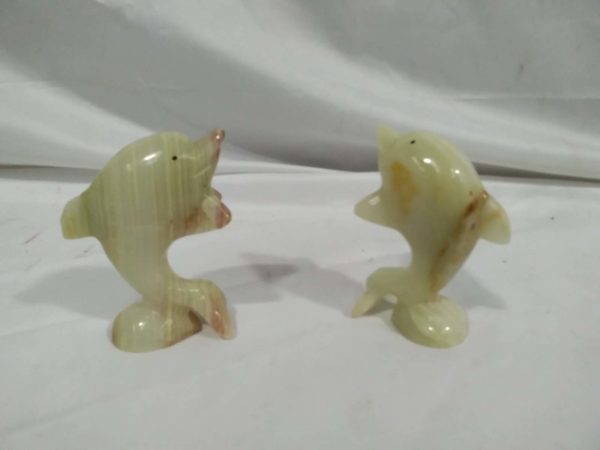 lot 465 pair of dolphin onyx ornaments